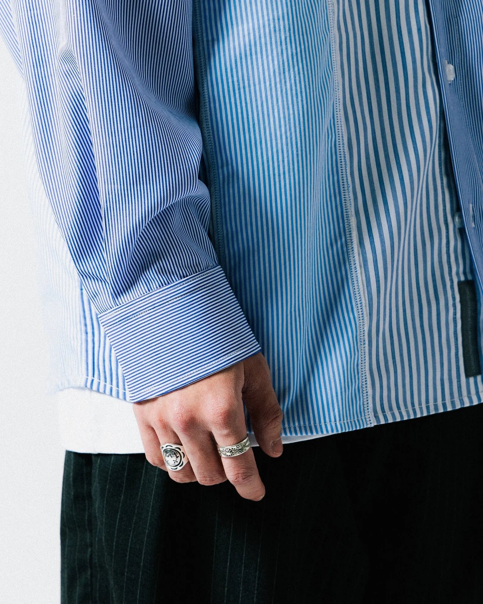 A Eckhaus Latta Shirt pictured on a model in front of a white background. The title of the product is Eckhaus Latta Eclipse Turtleneck - Stone and the image was taken by 199A®.