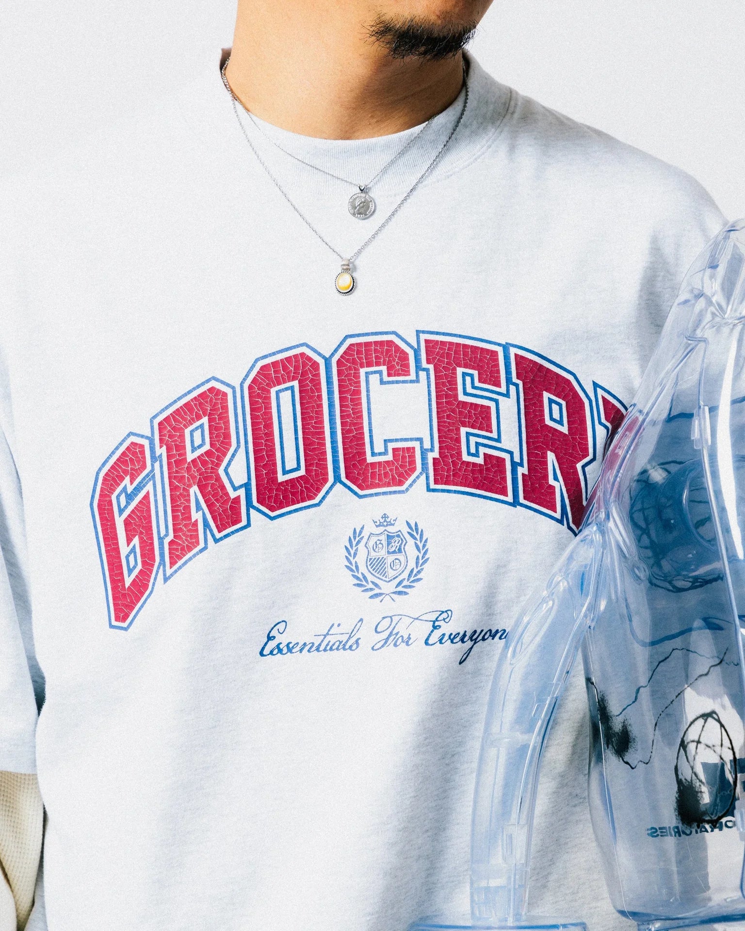 A Eckhaus Latta Shirt pictured on a model in front of a white background. The title of the product is Eckhaus Latta Eclipse Turtleneck - Stone and the image was taken by 199A®.
