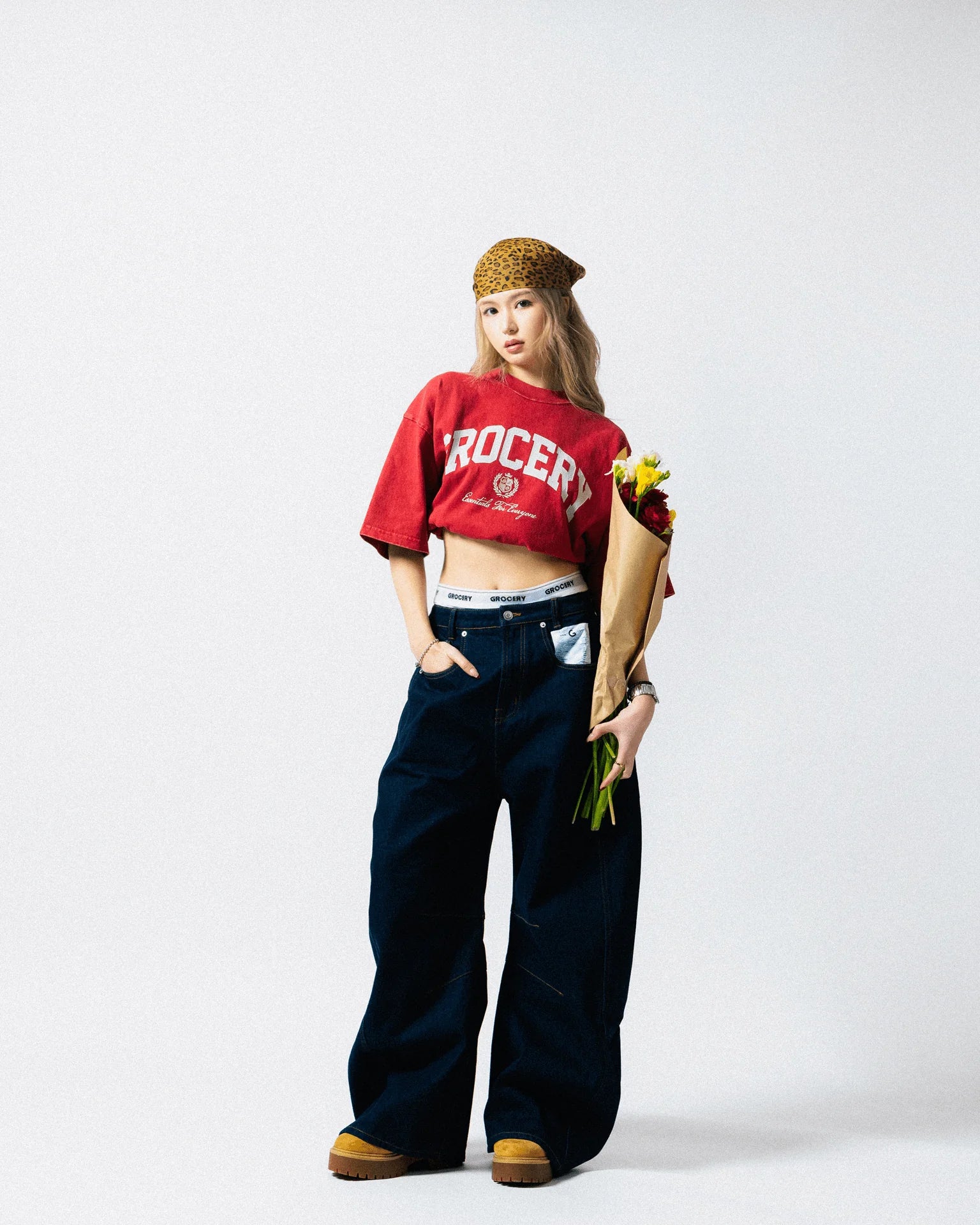 A Eckhaus Latta Shirt pictured on a model in front of a white background. The title of the product is Eckhaus Latta Eclipse Turtleneck - Stone and the image was taken by 199A®.