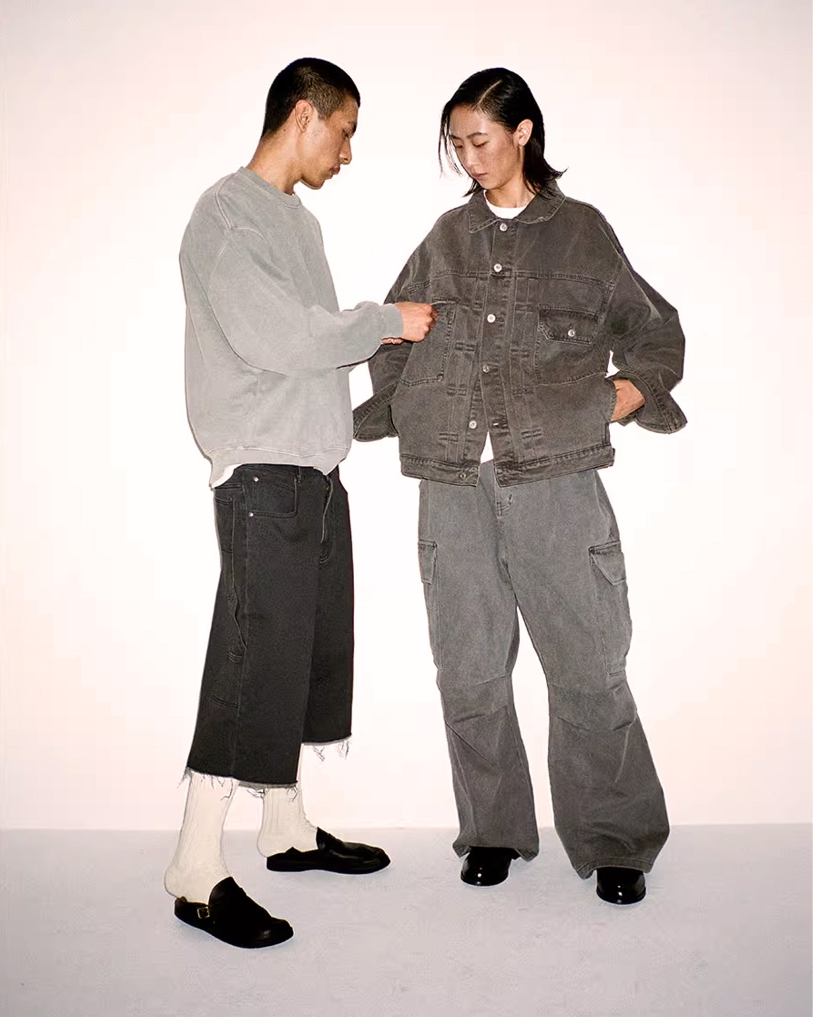 A Eckhaus Latta Shirt pictured on a model in front of a white background. The title of the product is Eckhaus Latta Eclipse Turtleneck - Stone and the image was taken by 199A®.