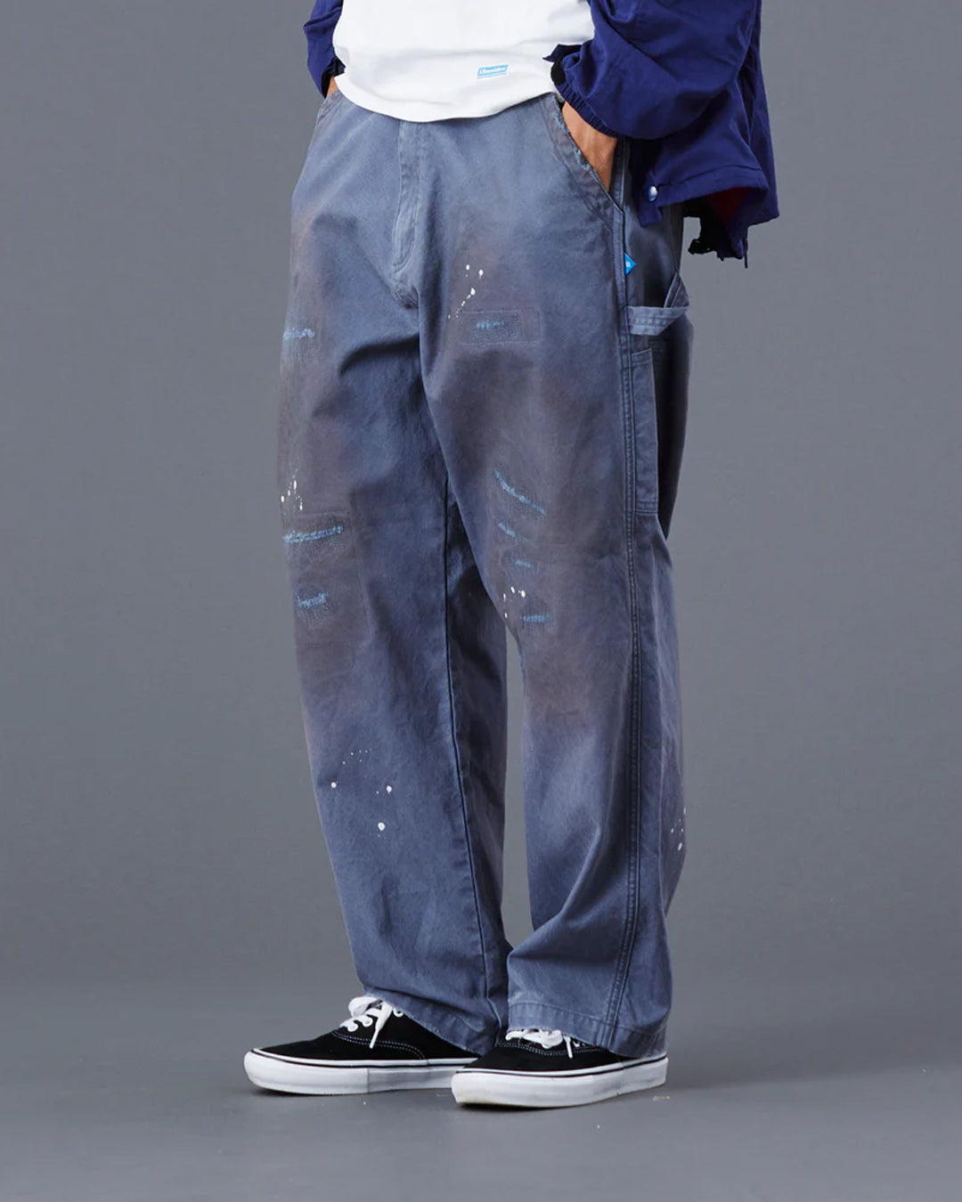 A Eckhaus Latta Shirt pictured on a model in front of a white background. The title of the product is Eckhaus Latta Eclipse Turtleneck - Stone and the image was taken by 199A®.