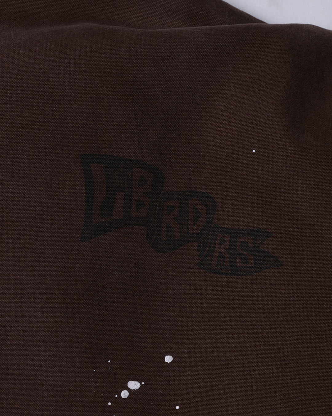 A Eckhaus Latta Shirt pictured on a model in front of a white background. The title of the product is Eckhaus Latta Eclipse Turtleneck - Stone and the image was taken by 199A®.