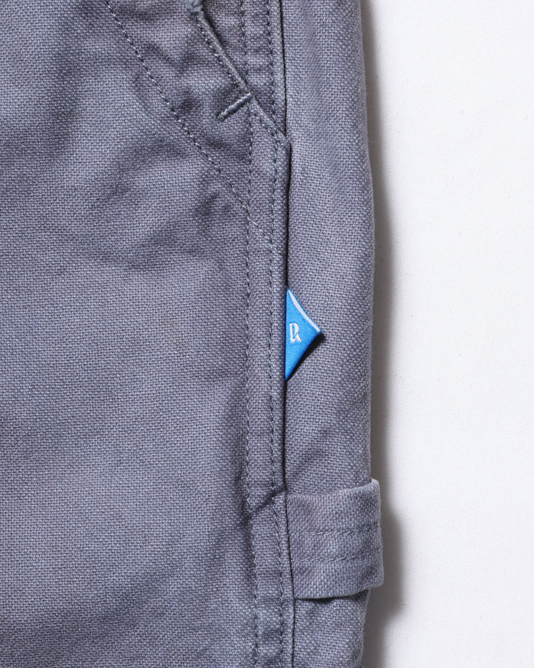 A Eckhaus Latta Shirt pictured on a model in front of a white background. The title of the product is Eckhaus Latta Eclipse Turtleneck - Stone and the image was taken by 199A®.