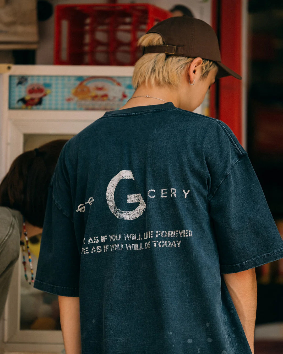 A Eckhaus Latta Shirt pictured on a model in front of a white background. The title of the product is Eckhaus Latta Eclipse Turtleneck - Stone and the image was taken by 199A®.