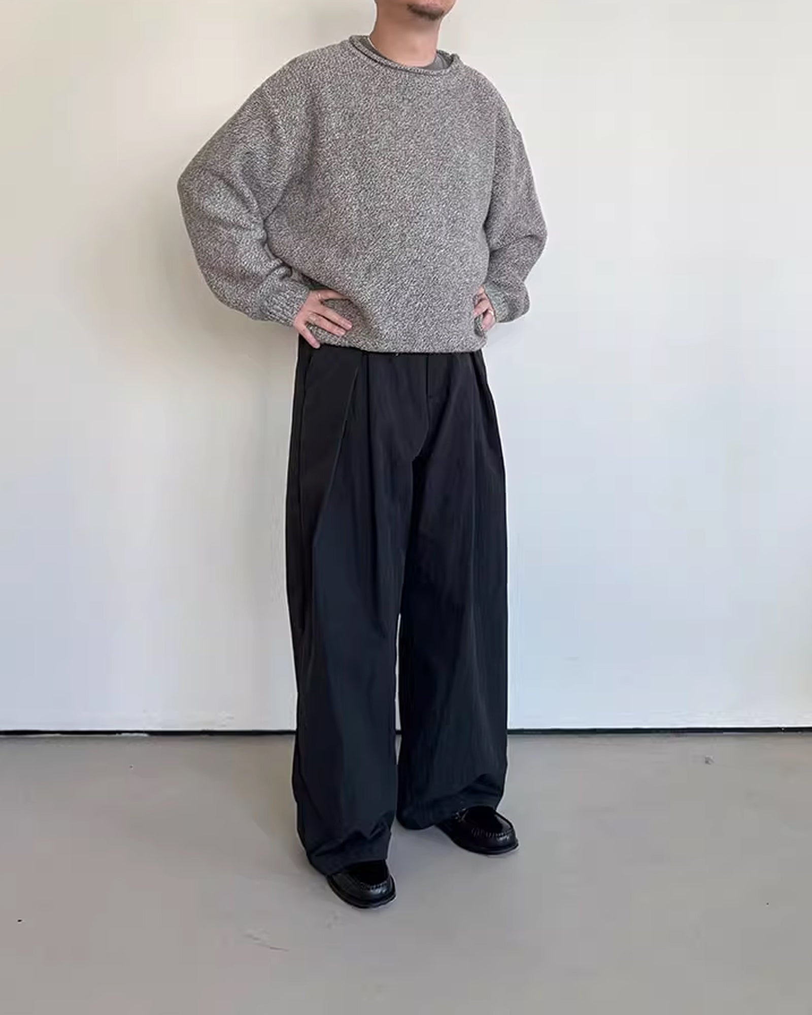 A Eckhaus Latta Shirt pictured on a model in front of a white background. The title of the product is Eckhaus Latta Eclipse Turtleneck - Stone and the image was taken by 199A®.