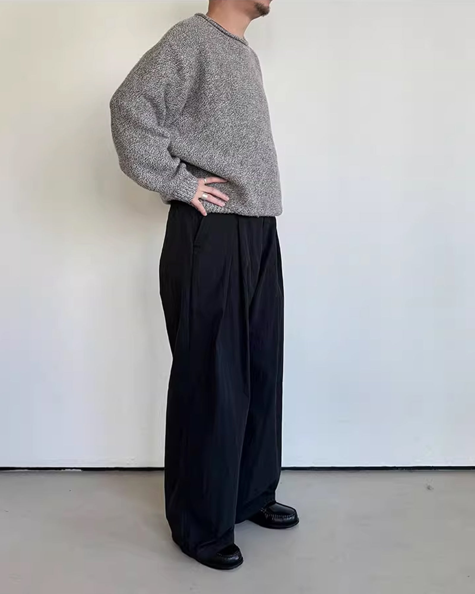 A Eckhaus Latta Shirt pictured on a model in front of a white background. The title of the product is Eckhaus Latta Eclipse Turtleneck - Stone and the image was taken by 199A®.