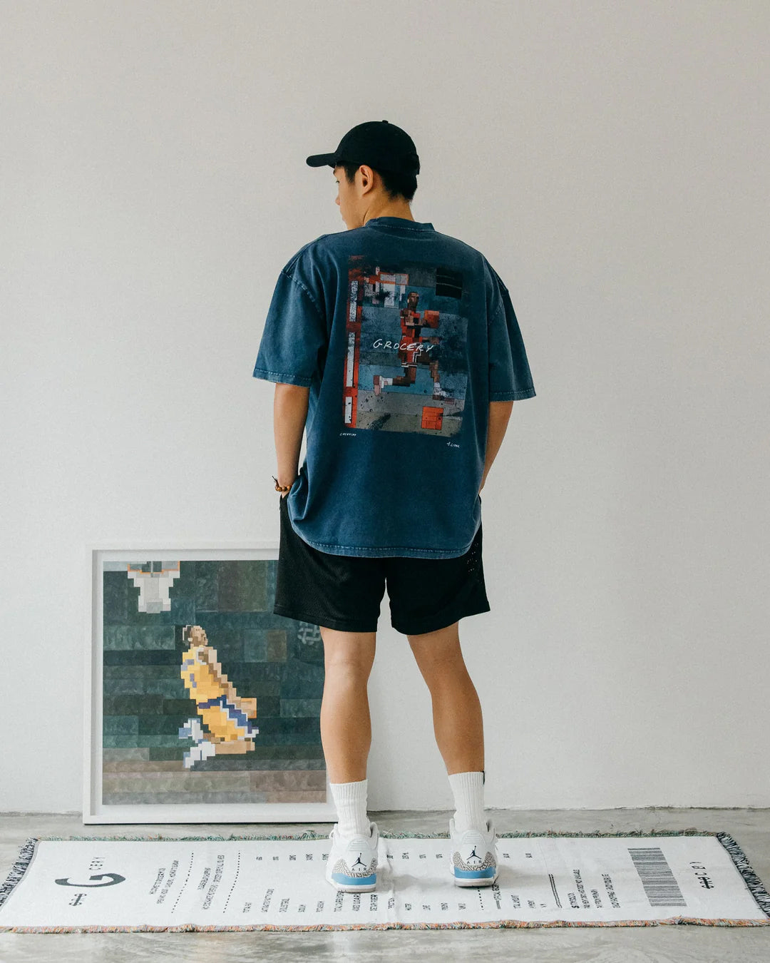 A Eckhaus Latta Shirt pictured on a model in front of a white background. The title of the product is Eckhaus Latta Eclipse Turtleneck - Stone and the image was taken by 199A®.