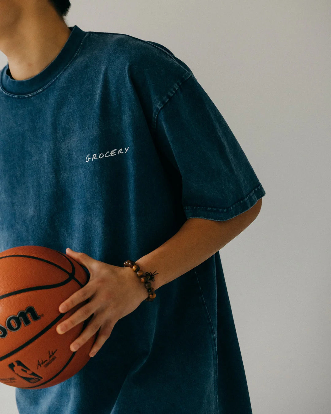 A Eckhaus Latta Shirt pictured on a model in front of a white background. The title of the product is Eckhaus Latta Eclipse Turtleneck - Stone and the image was taken by 199A®.