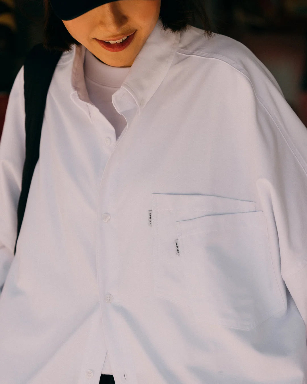 A Eckhaus Latta Shirt pictured on a model in front of a white background. The title of the product is Eckhaus Latta Eclipse Turtleneck - Stone and the image was taken by 199A®.